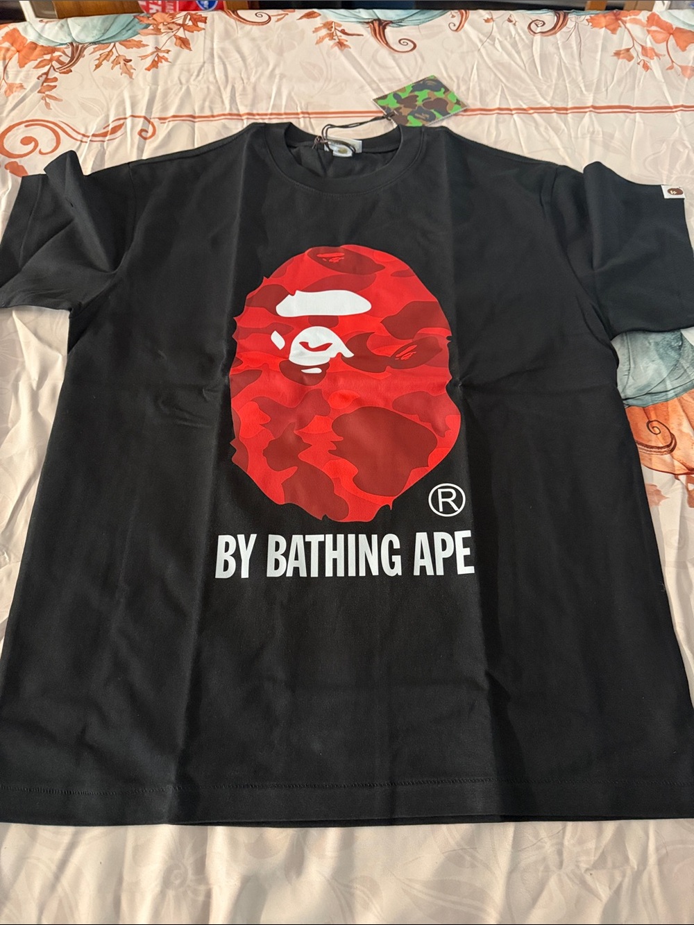 A Bathing Ape Black Tee with Red Camo Ape Logo